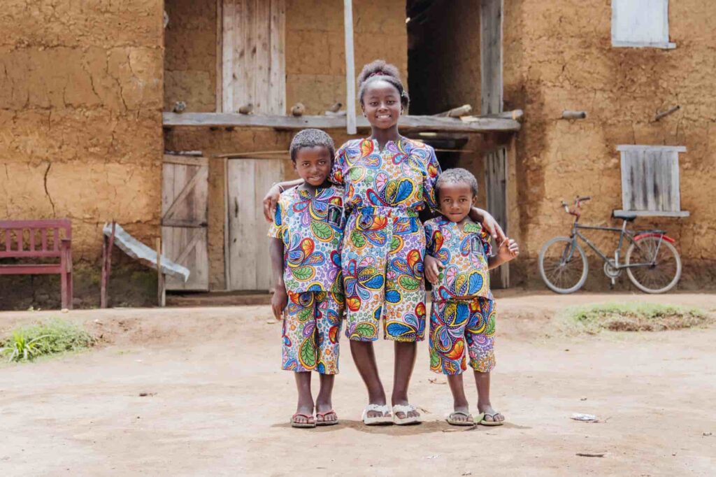 Fenitra, Rolland, and Rody, three siblings in orthopedics, returning home after surgery